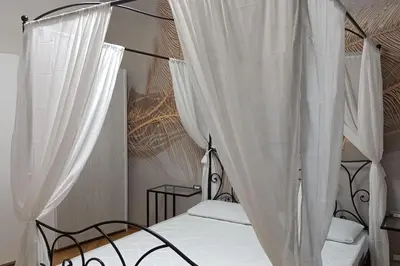 Letto o letti in una camera di Sara Home Florence