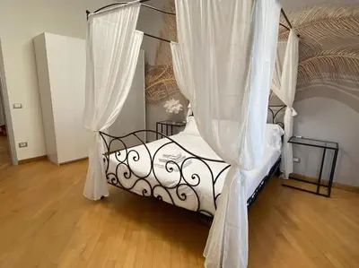 Letto o letti in una camera di Sara Home Florence