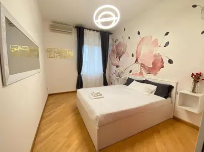 Letto o letti in una camera di Sara Home Florence