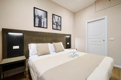 Letto o letti in una camera di Clés de Florence