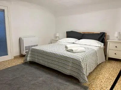 Letto o letti in una camera di Sweet Home Capponi