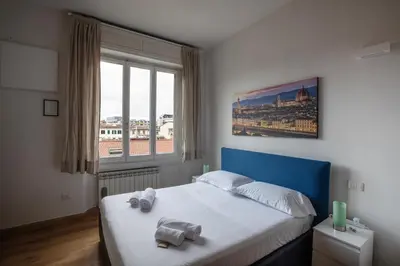 Letto o letti in una camera di Scarlatti - Boutique Home in Florence