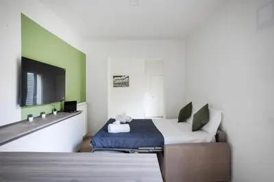 Letto o letti in una camera di Gioconda Boutique Apartment