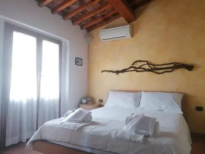 Letto o letti in una camera di benvenuti al piccolo mulino
