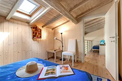 Letto o letti in una camera di Cozy Trekking Home La Via degli Dei - Happy Rentals