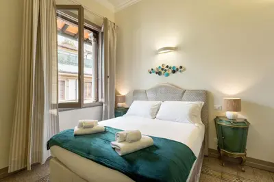 Letto o letti in una camera di Dimora le mantellate, Firenze centro storico