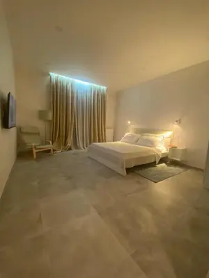 Letto o letti in una camera di RifReady Apartment con posto auto vicino a AOU Careggi, Meyer, Polo UniFi