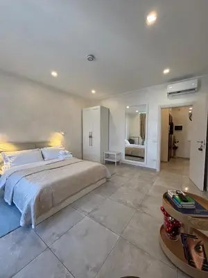 Letto o letti in una camera di RifReady Apartment con posto auto vicino a AOU Careggi, Meyer, Polo UniFi