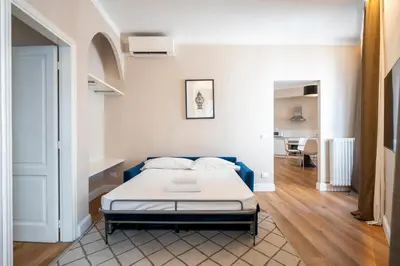 Letto o letti in una camera di Florence Eye Accomodations by Hôtea