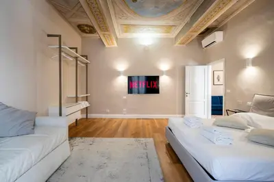 Letto o letti in una camera di Florence Eye Accomodations by Hôtea