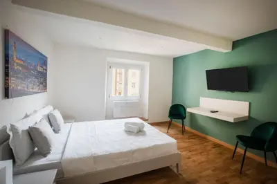 Letto o letti in una camera di Mona Lisa - Boutique Home in Florence