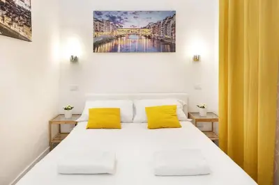 Letto o letti in una camera di Comfy San Lorenzo