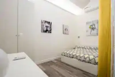 Letto o letti in una camera di Comfy San Lorenzo