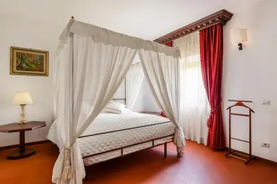 Letto o letti in una camera di Dimora Machiavelli