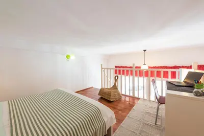 Letto o letti in una camera di Bartolommeo Scala Loft by Mmega