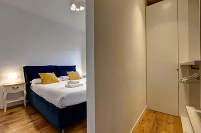 Letto o letti in una camera di Sant'Anna Apartment