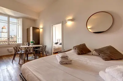 Letto o letti in una camera di Sant'Anna Apartment