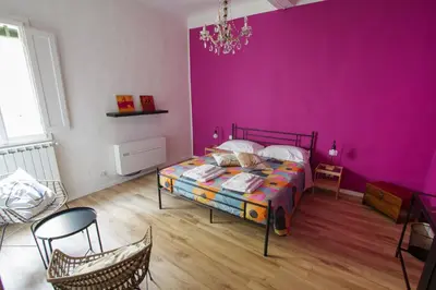 Letto o letti in una camera di Santa Croce Rainbow