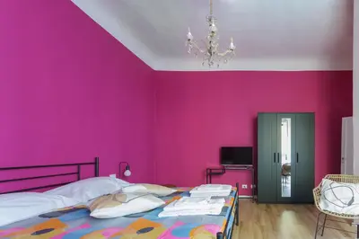 Letto o letti in una camera di Santa Croce Rainbow