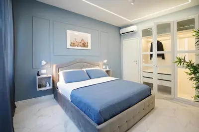 Letto o letti in una camera di Sky suite downtown SMN ,train station,2 letti,balcone