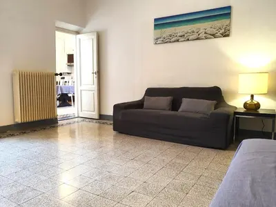 Area soggiorno di Very Central Apartment 30 Seconds From Uffizi Gallery