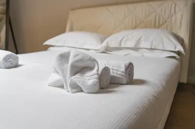 Letto o letti in una camera di Elegant Penthouse in Santo Spirito