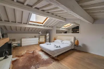 Letto o letti in una camera di Elegant Penthouse in Santo Spirito