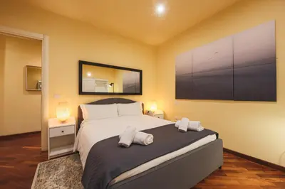 Letto o letti in una camera di Apartments Florence- Dante's View-Piazza Santa Croce in the heart of Florence