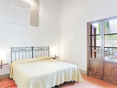 Letto o letti in una camera di Apartment Il Mandorlato by Interhome