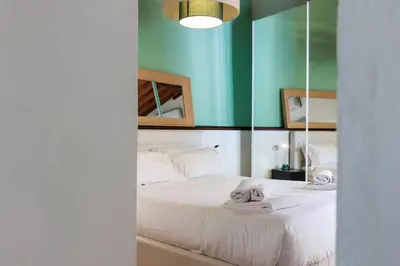 Letto o letti in una camera di Santa Maria Novella Elegant