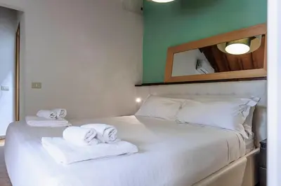 Letto o letti in una camera di Santa Maria Novella Elegant