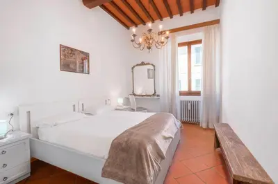 Letto o letti in una camera di Chiara Apartment In Porta San Frediano Florence