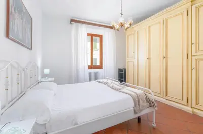 Letto o letti in una camera di Chiara Apartment In Porta San Frediano Florence