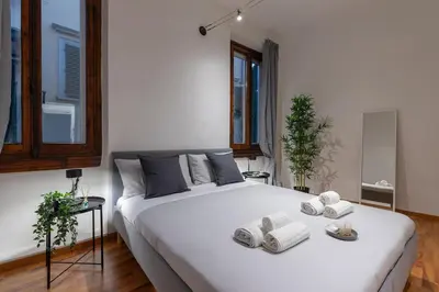 Letto o letti in una camera di Dietro al Duomo Free Wi-Fi