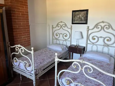 Letto o letti in una camera di Buonarroti