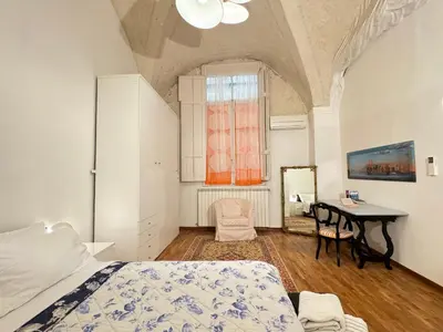 Letto o letti in una camera di Casa Stefano