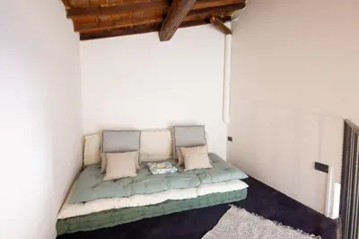 Letto o letti in una camera di GuestHost - Sant'Ambrogio Gem - Chic Florence Nest