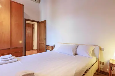 Letto o letti in una camera di Savonarola Loft