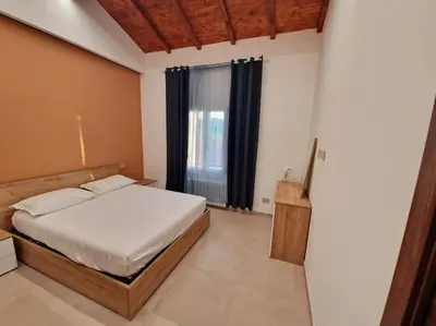 Letto o letti in una camera di Appartamento Ombra