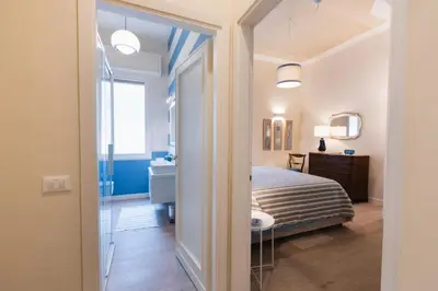 Letto o letti in una camera di Cozy olive green flat