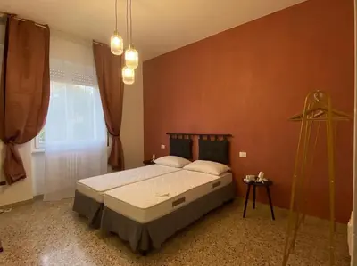 Letto o letti in una camera di Samuele Home Florence