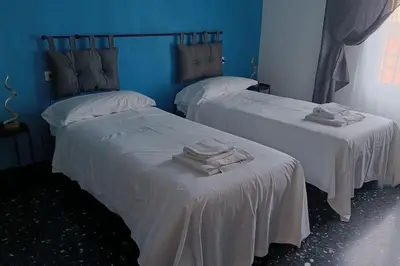 Letto o letti in una camera di Samuele Home Florence
