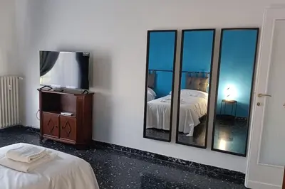 Letto o letti in una camera di Samuele Home Florence