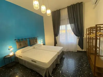 Letto o letti in una camera di Samuele Home Florence