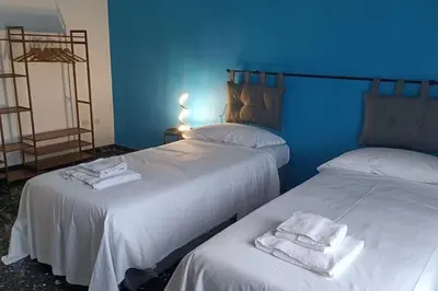 Letto o letti in una camera di Samuele Home Florence