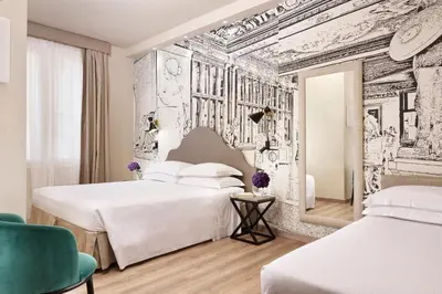 Letto o letti in una camera di FH55 Med Executive Hotel