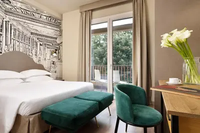 Letto o letti in una camera di FH55 Med Executive Hotel