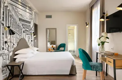 Letto o letti in una camera di FH55 Med Executive Hotel