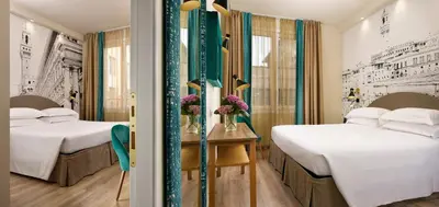 Letto o letti in una camera di FH55 Med Executive Hotel
