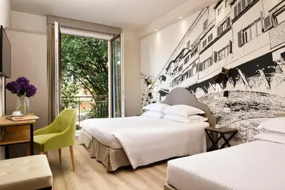 Letto o letti in una camera di FH55 Med Executive Hotel